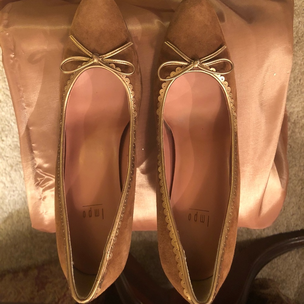 Tan suede with gold trim shoes